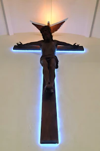 A serene painting of Jesus Christ with soft light illuminating his face, evoking peace and hope.