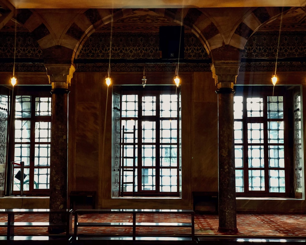 brown wooden framed glass window