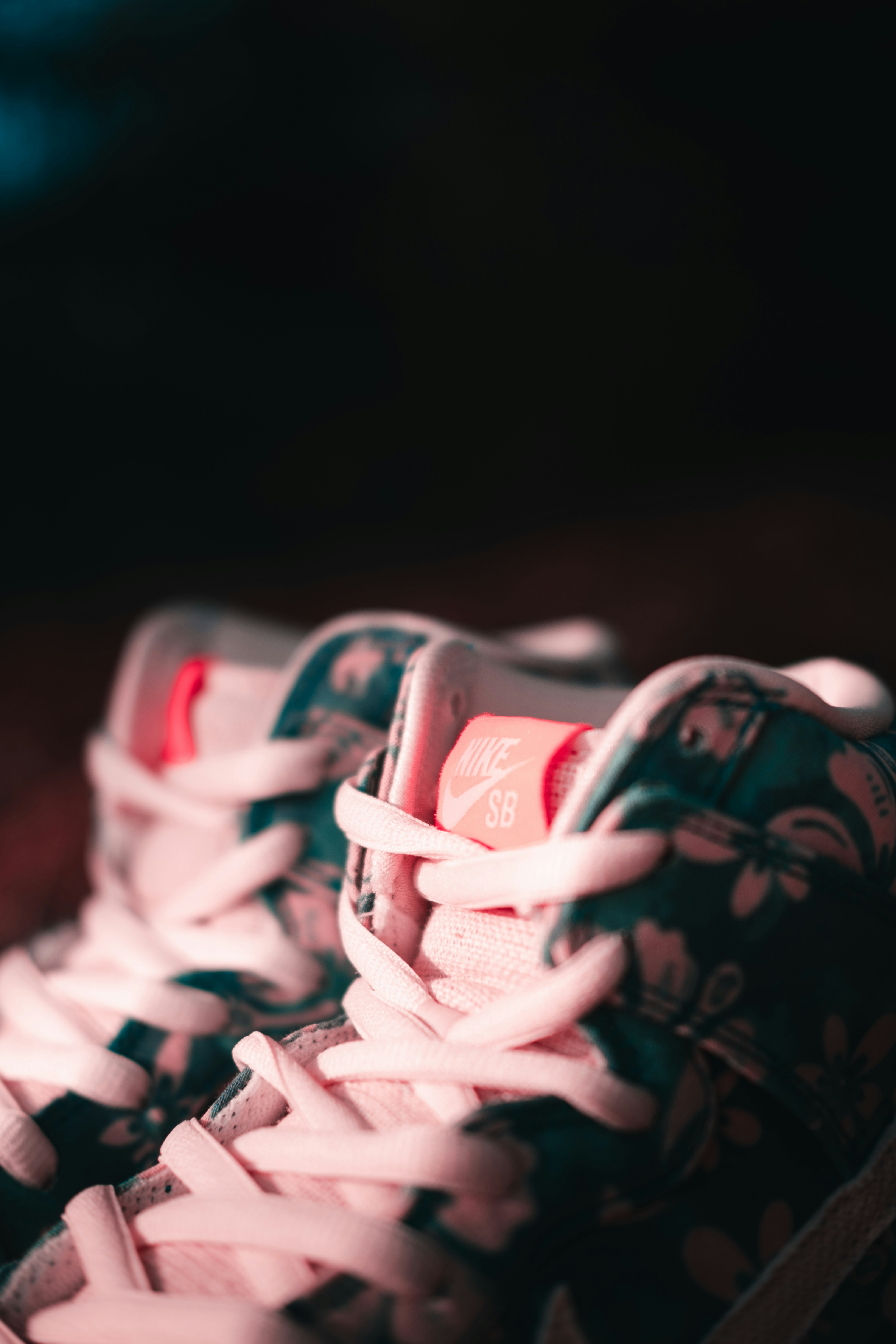 mens white nike shoes with red swoosh