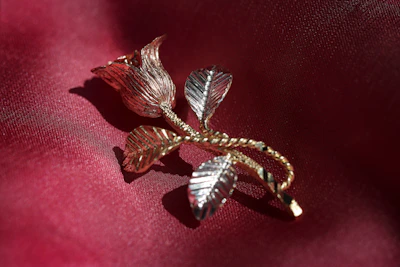 Dusty rose textured background with subtle gold accents reflecting luxury.