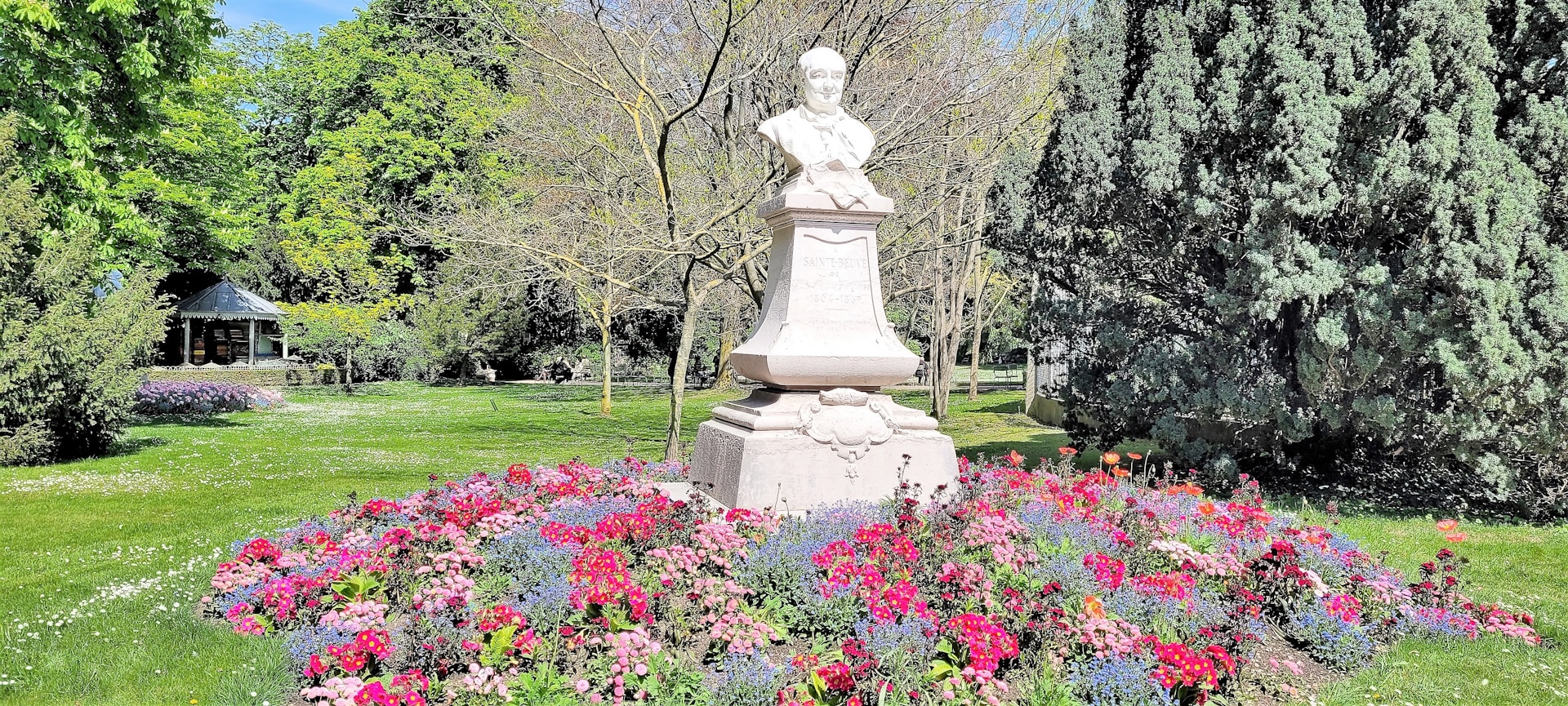 woman wearing yellow long-sleeved dress under white clouds and blue sky during daytime