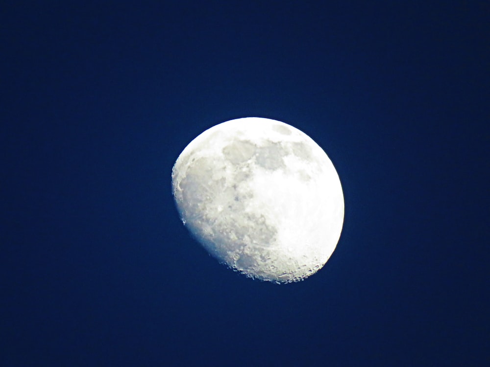 full moon in blue sky