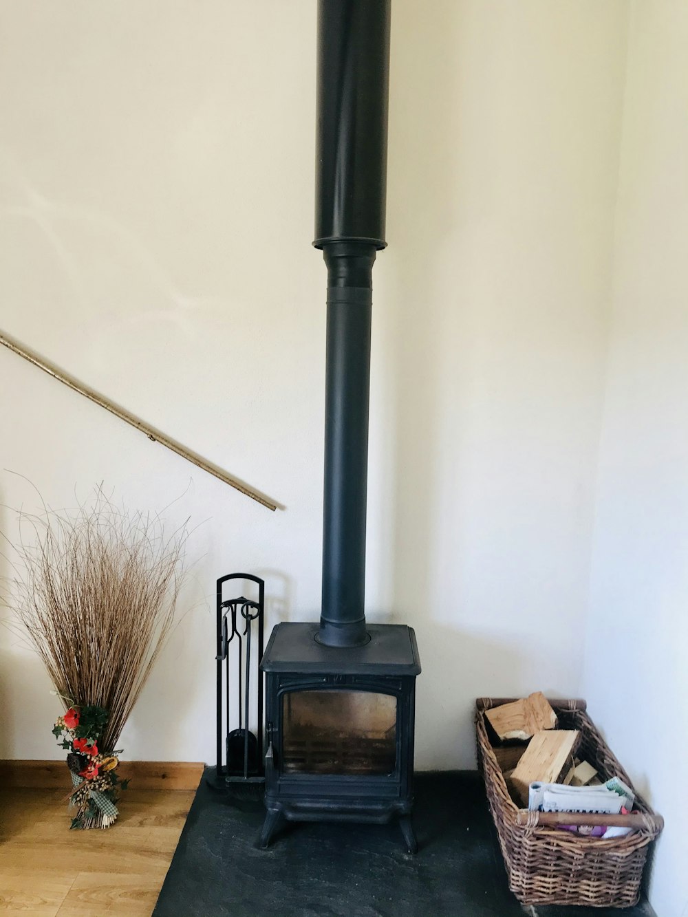 black wood burner near brown cardboard box