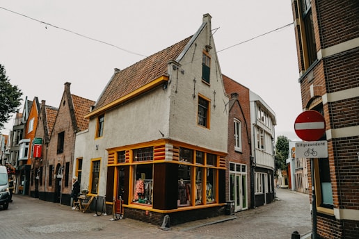 brown and white concrete building during daytime
