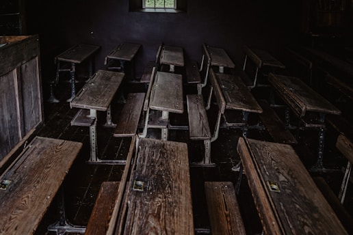 brown wooden table with chairs