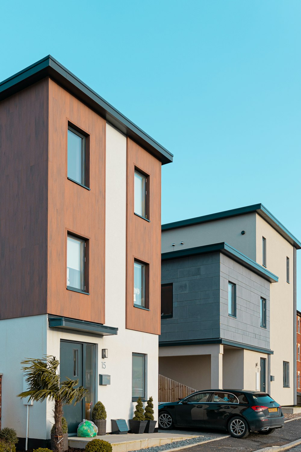 brown and white concrete building under blue sky during daytime