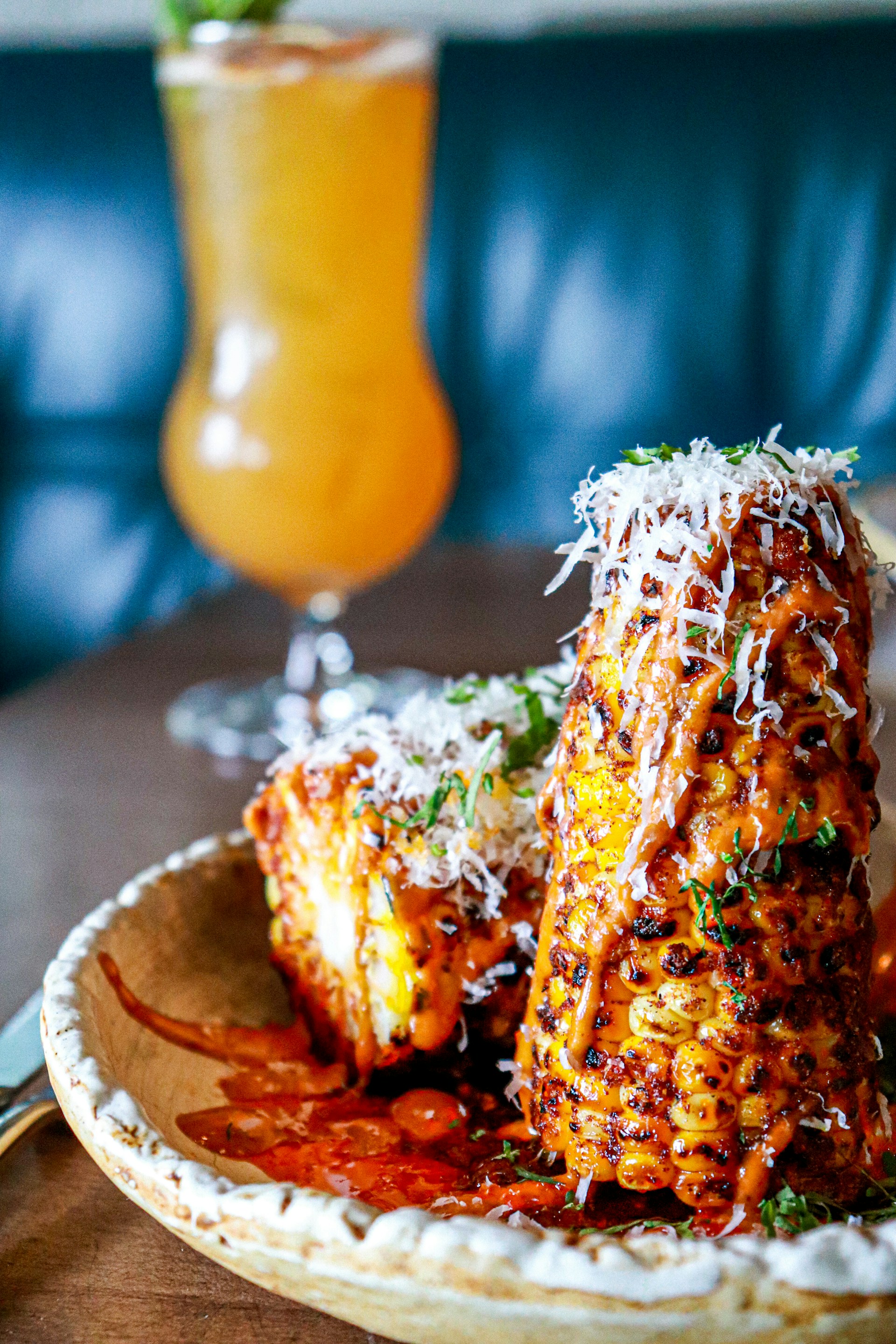 A delicious plate of corn cheese sandwiches, perfectly grilled and served with a side of dipping sauce.