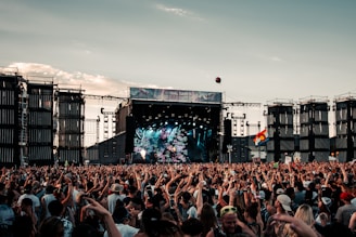 people gathering on concert during daytime