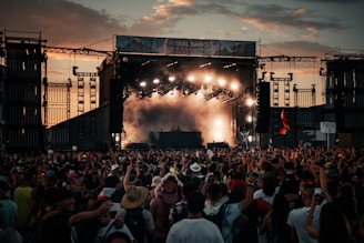people watching concert during daytime