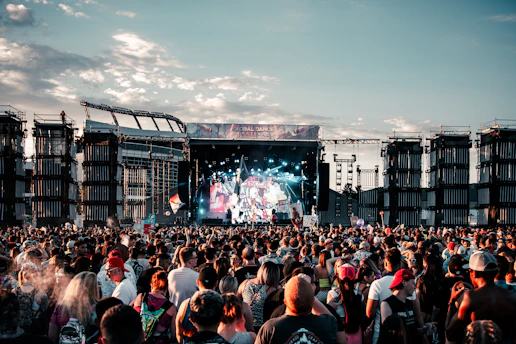 people gathering on concert during daytime