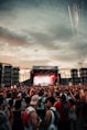 people gathering on concert during daytime