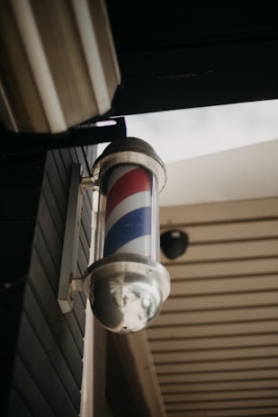 white and red striped post