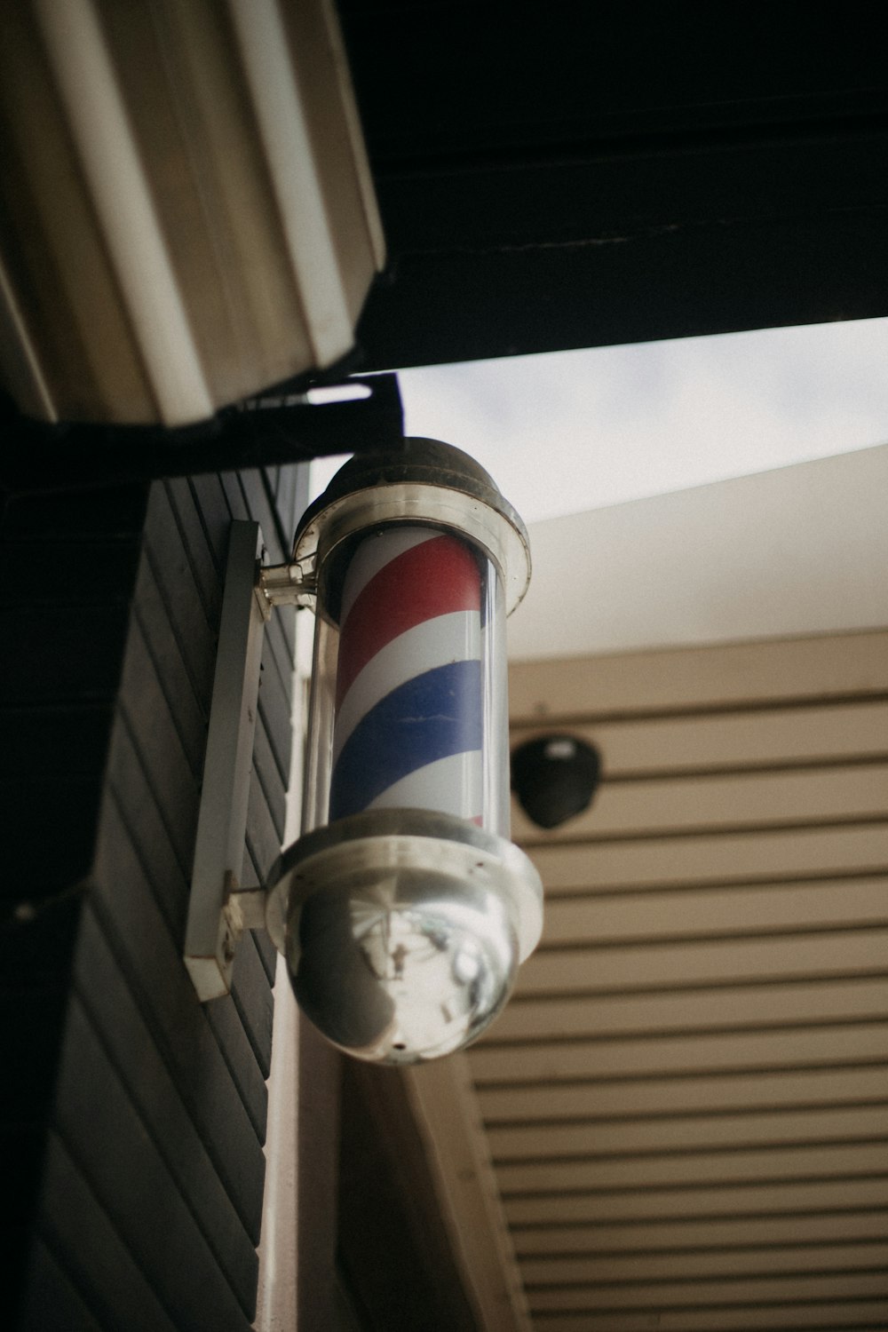 white and red striped post