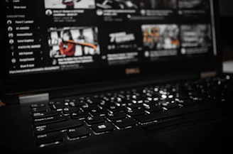 black laptop computer turned on displaying game application
