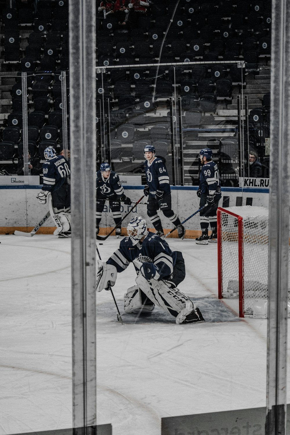 ice hockey players on ice hockey field