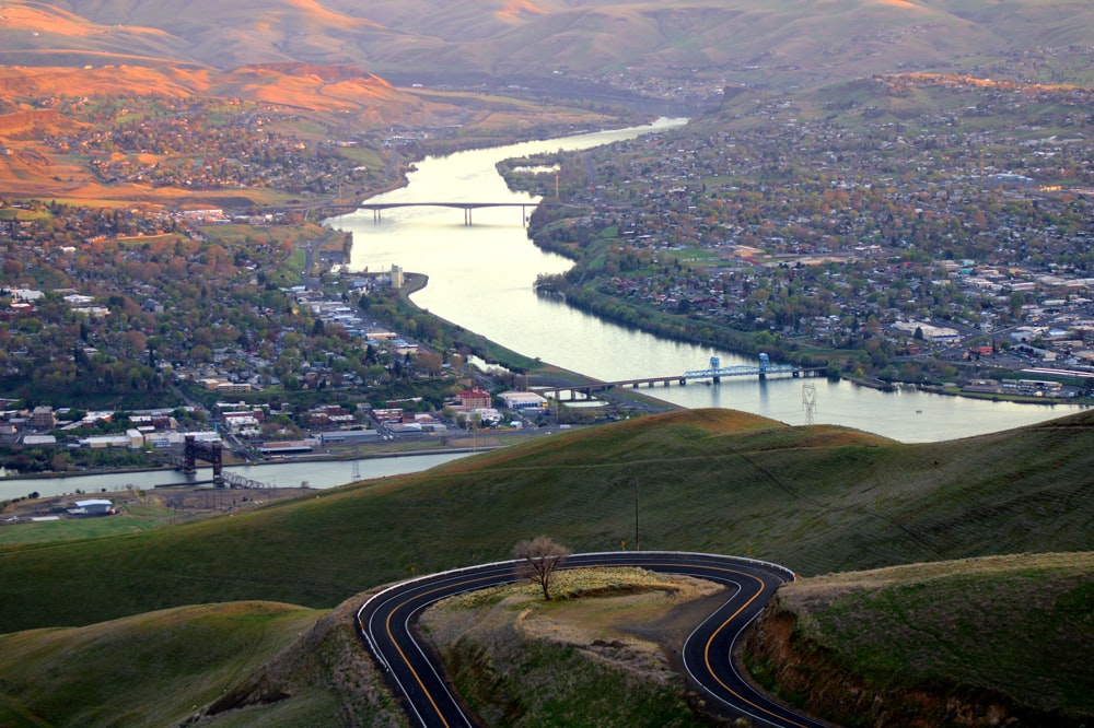 aerial view of city near river during daytime