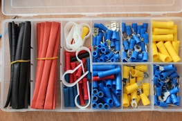 blue yellow red and white plastic tool