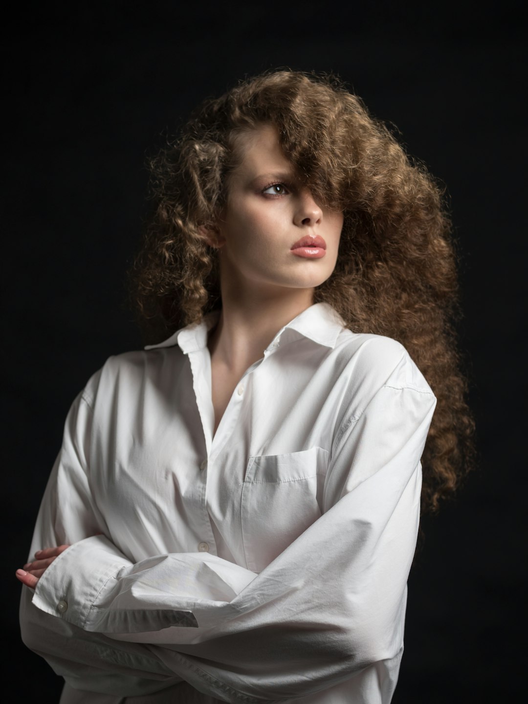 woman in white button up shirt