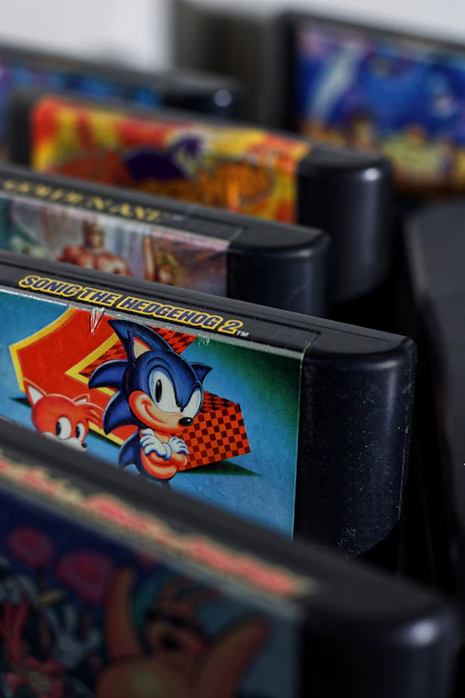 A conceptual image of classic game media being archived and catalogued