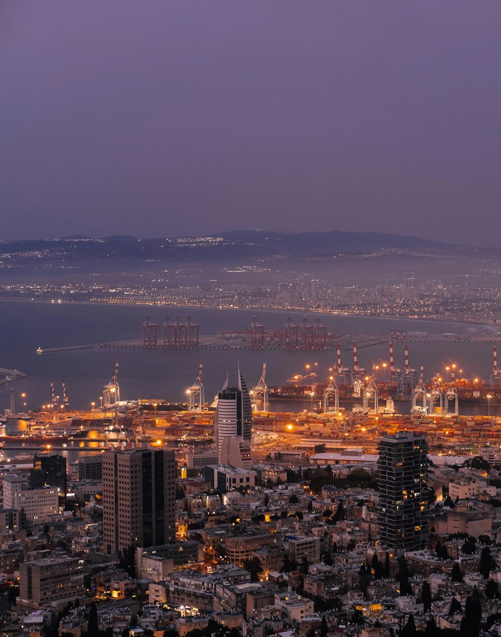 city skyline during night time