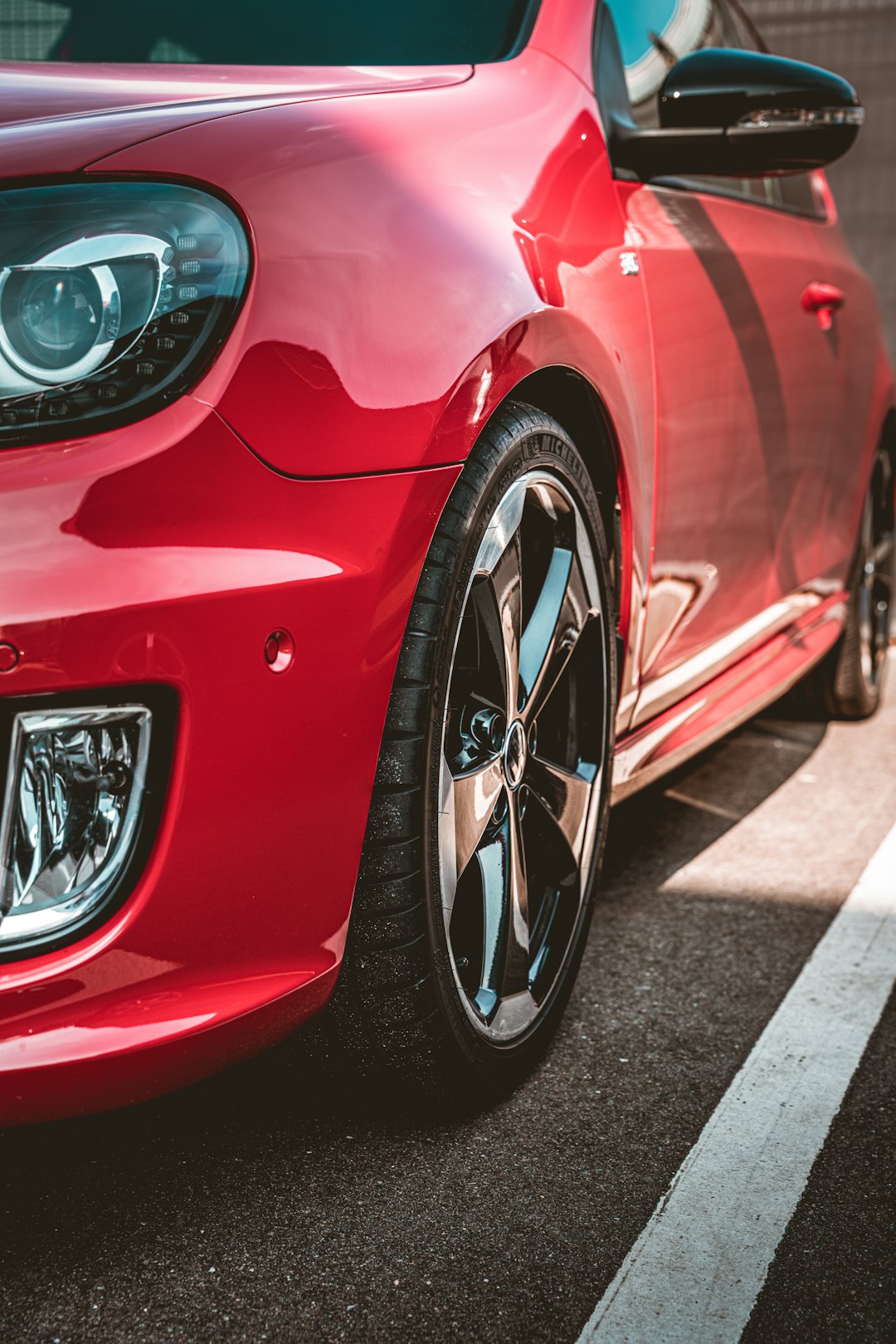 red ferrari car on road