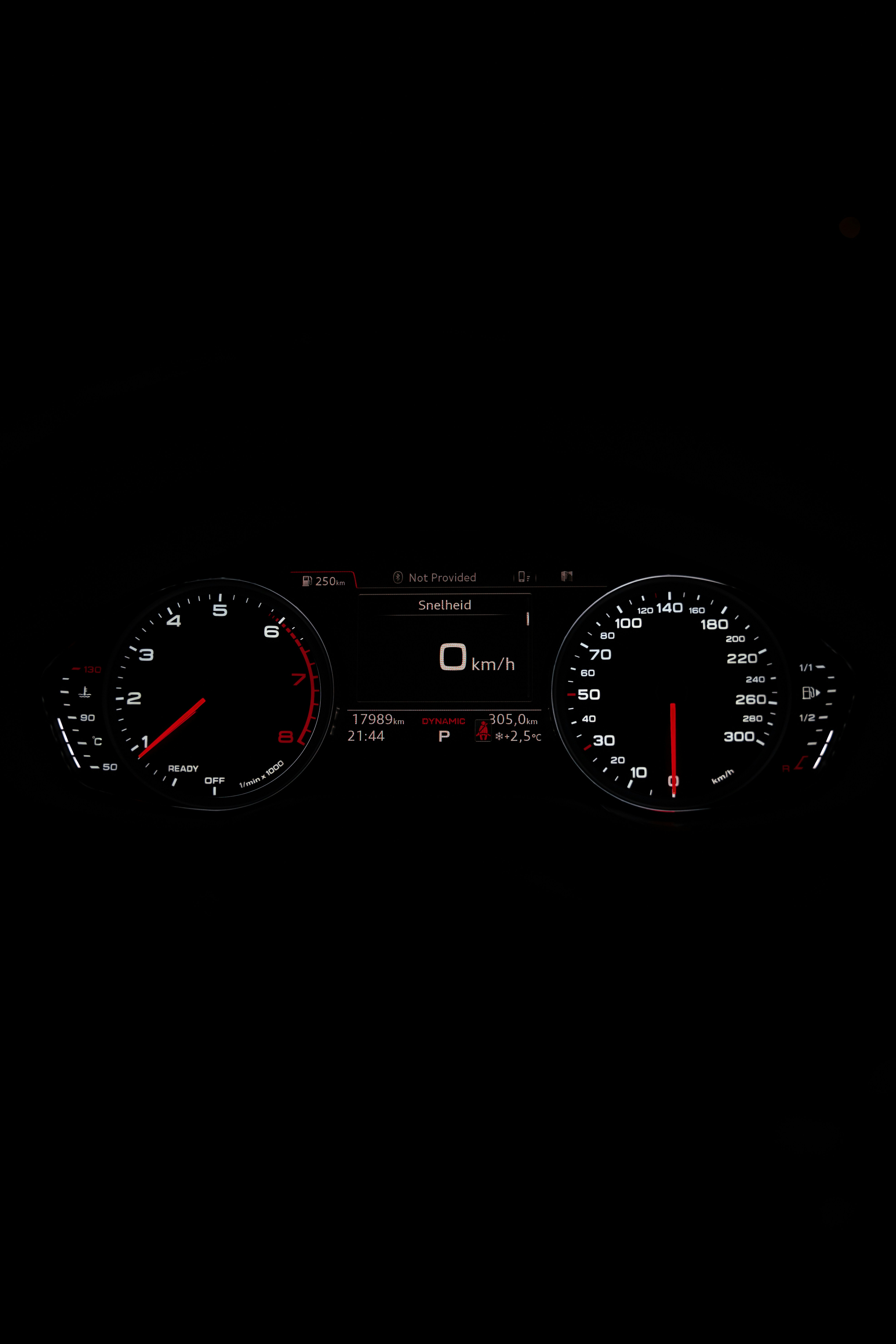 black and red analog speedometer