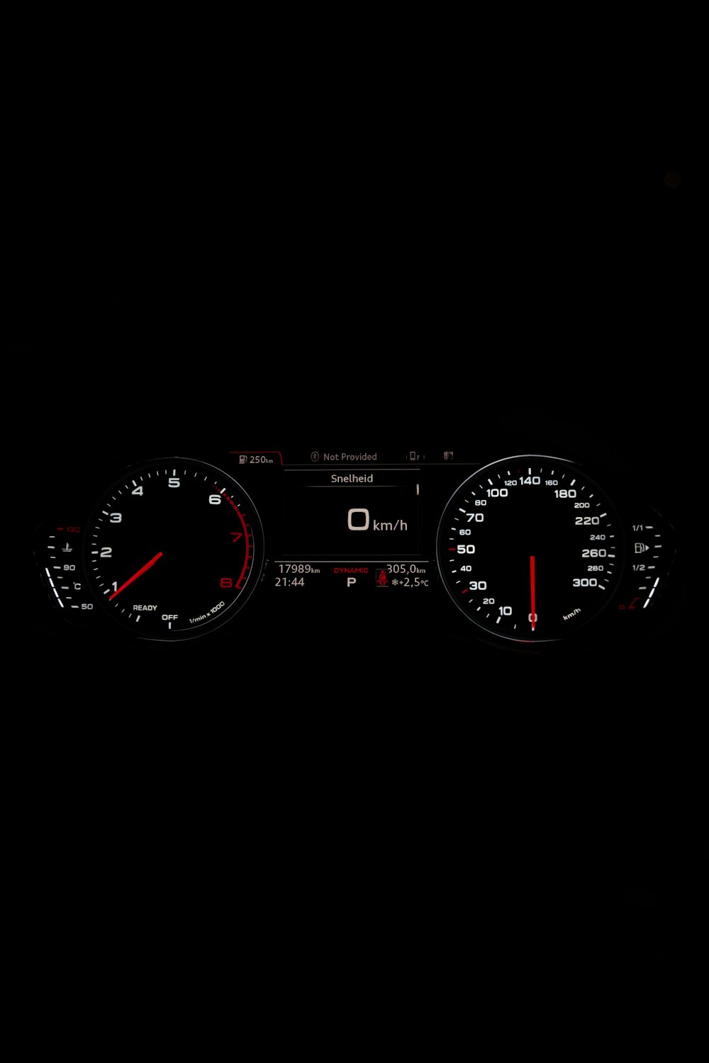 black and red analog speedometer