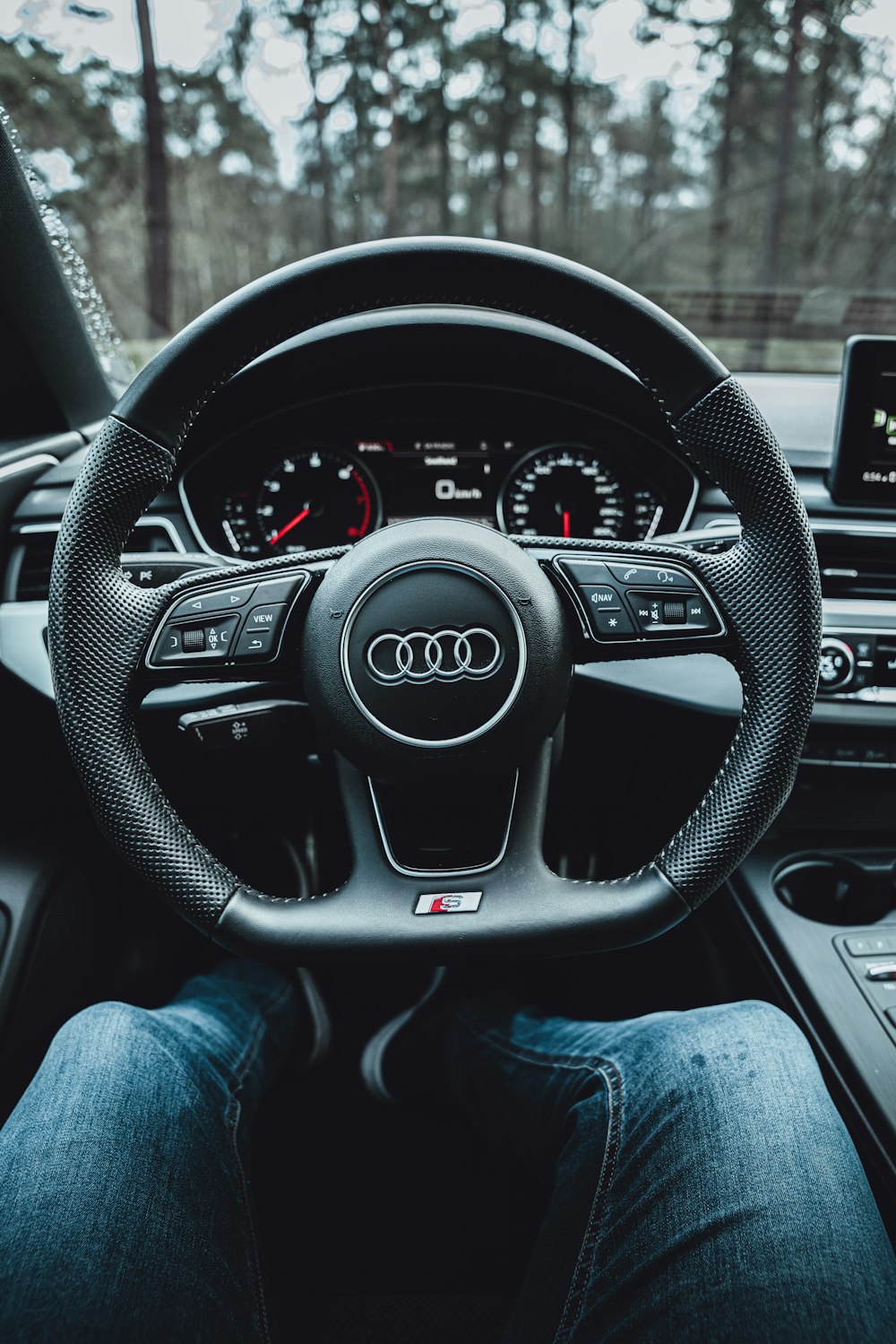 black and silver mercedes benz steering wheel