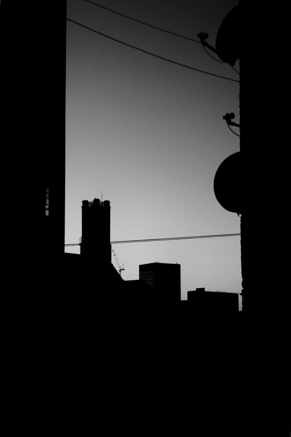 silhouette of building during sunset