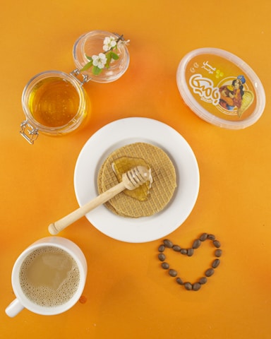 white ceramic cup with saucer