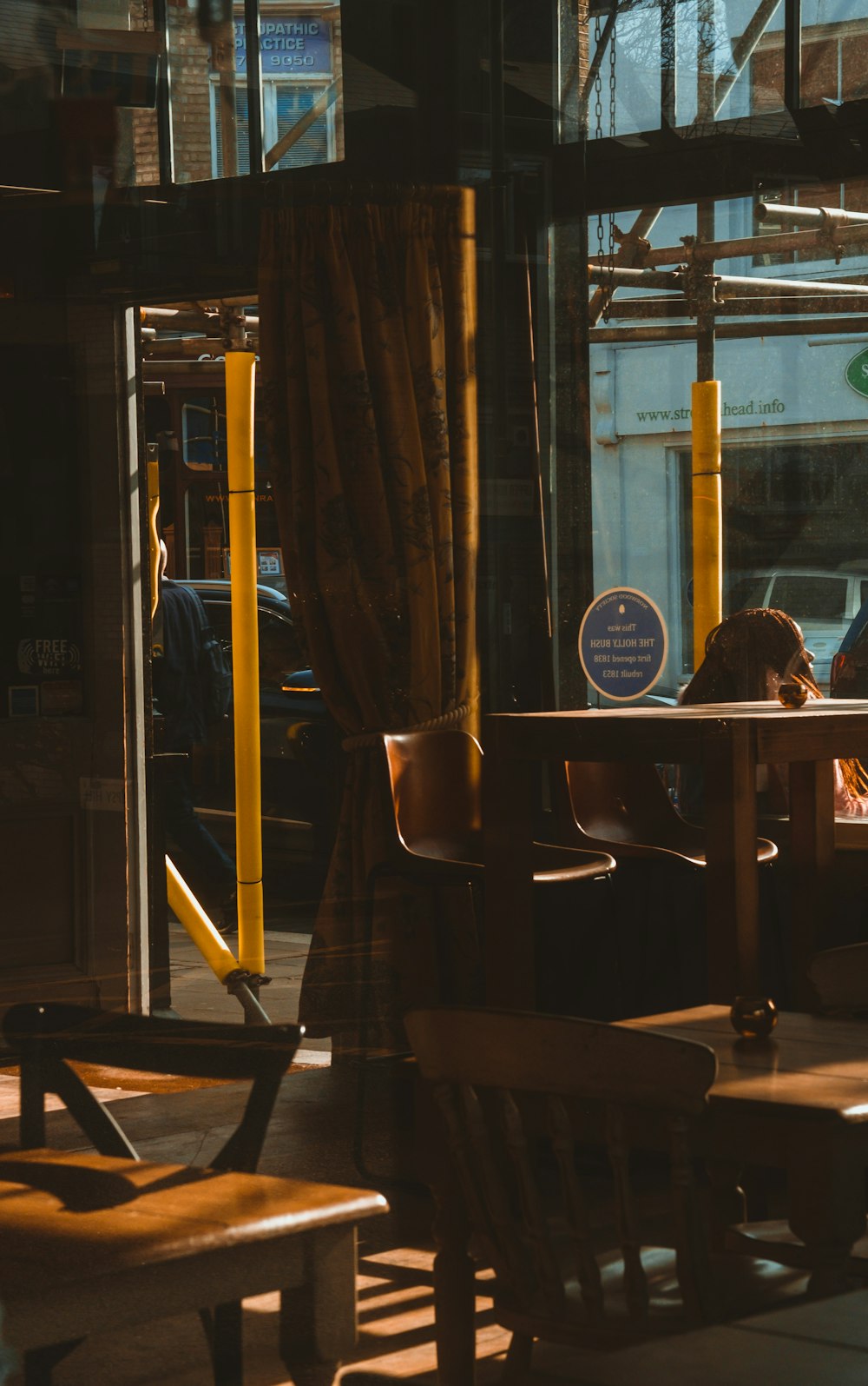 man in black shirt sitting on chair