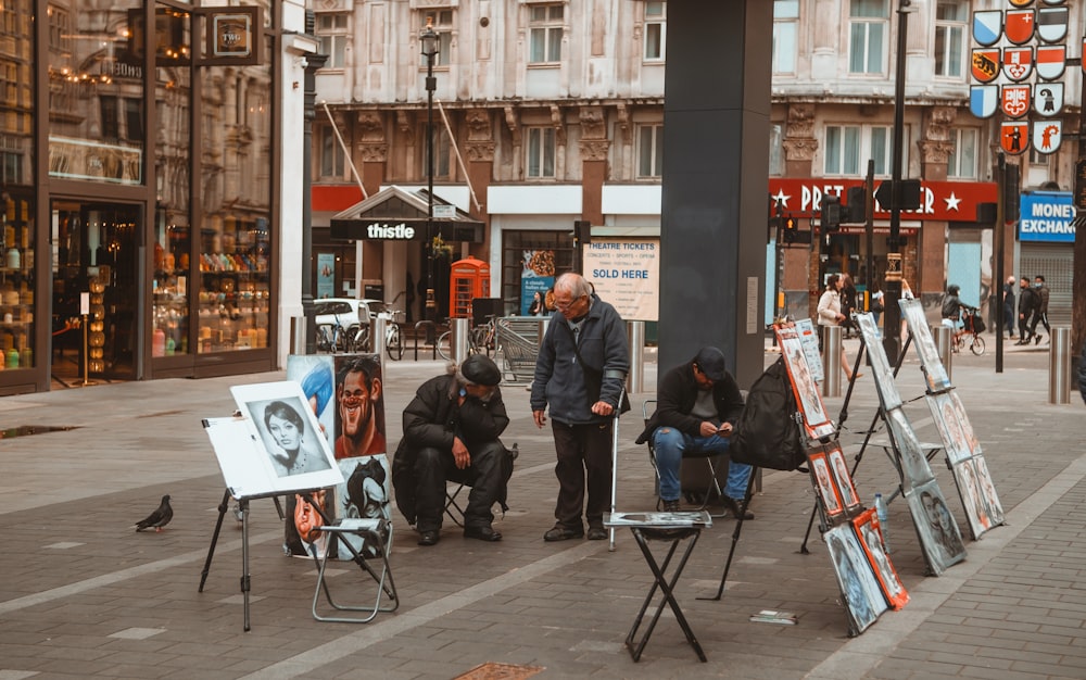 people sitting on chair in front of table