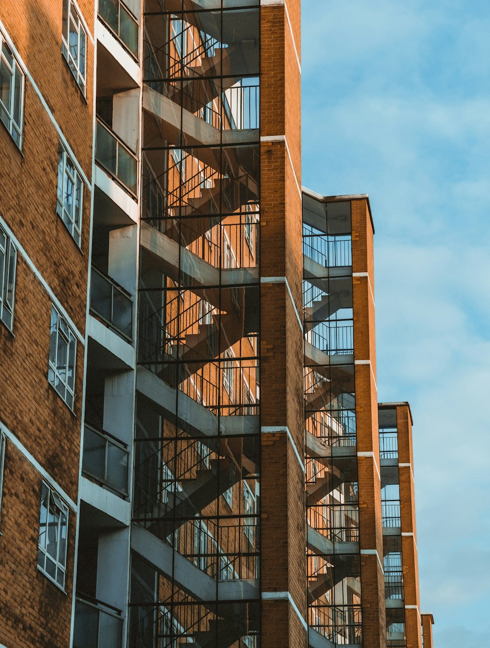 brown concrete building under blue sky during daytime