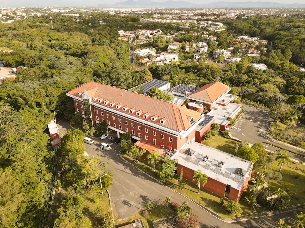 aerial view of brown and white concrete building during daytime