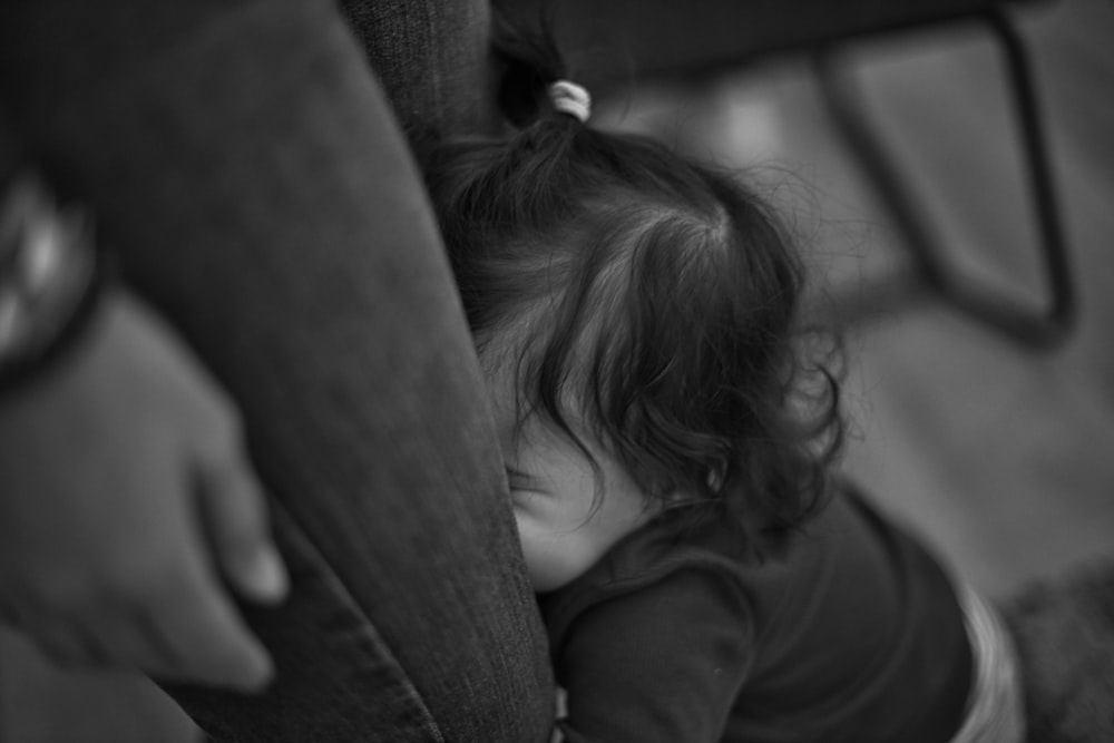 grayscale photo of girl in hoodie