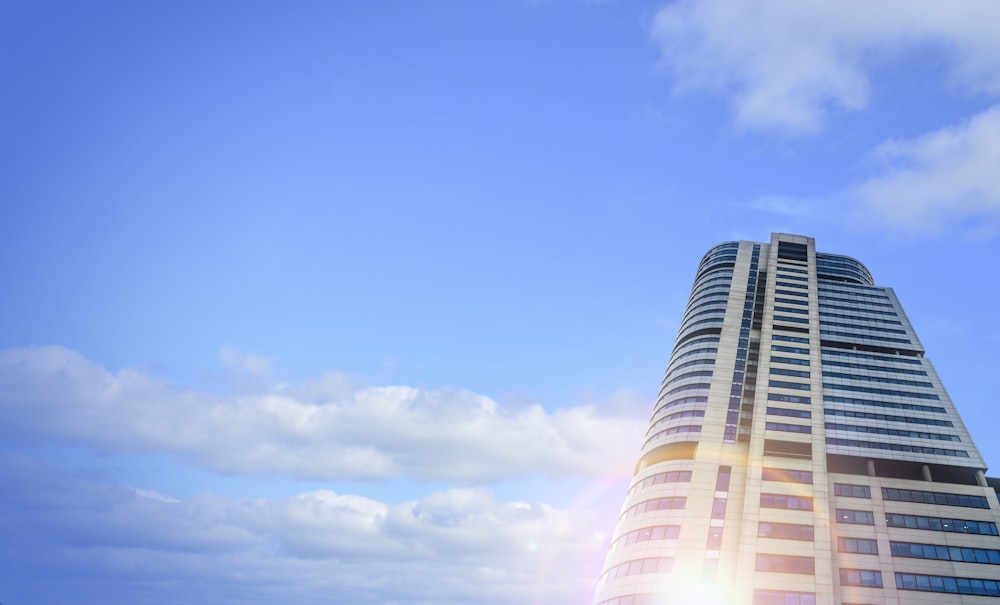 white and orange building under blue sky during daytime