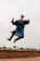 man in black academic dress and black mortar board