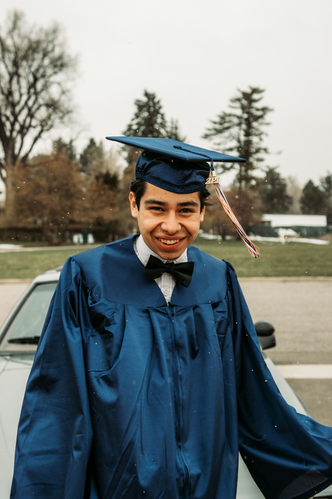 man in blue academic gown