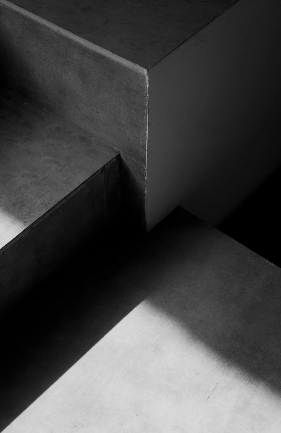 Concrete staircase in strong light and shadow