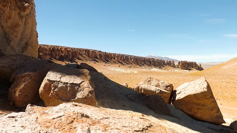 brown rocky mountain under blue sky during daytime