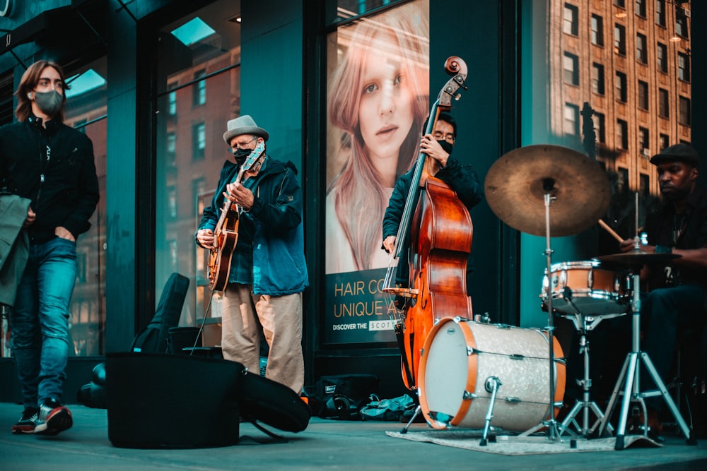 man playing violin on stage