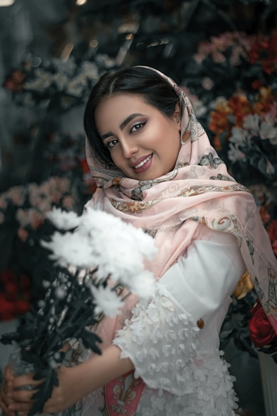 woman in white and brown floral hijab