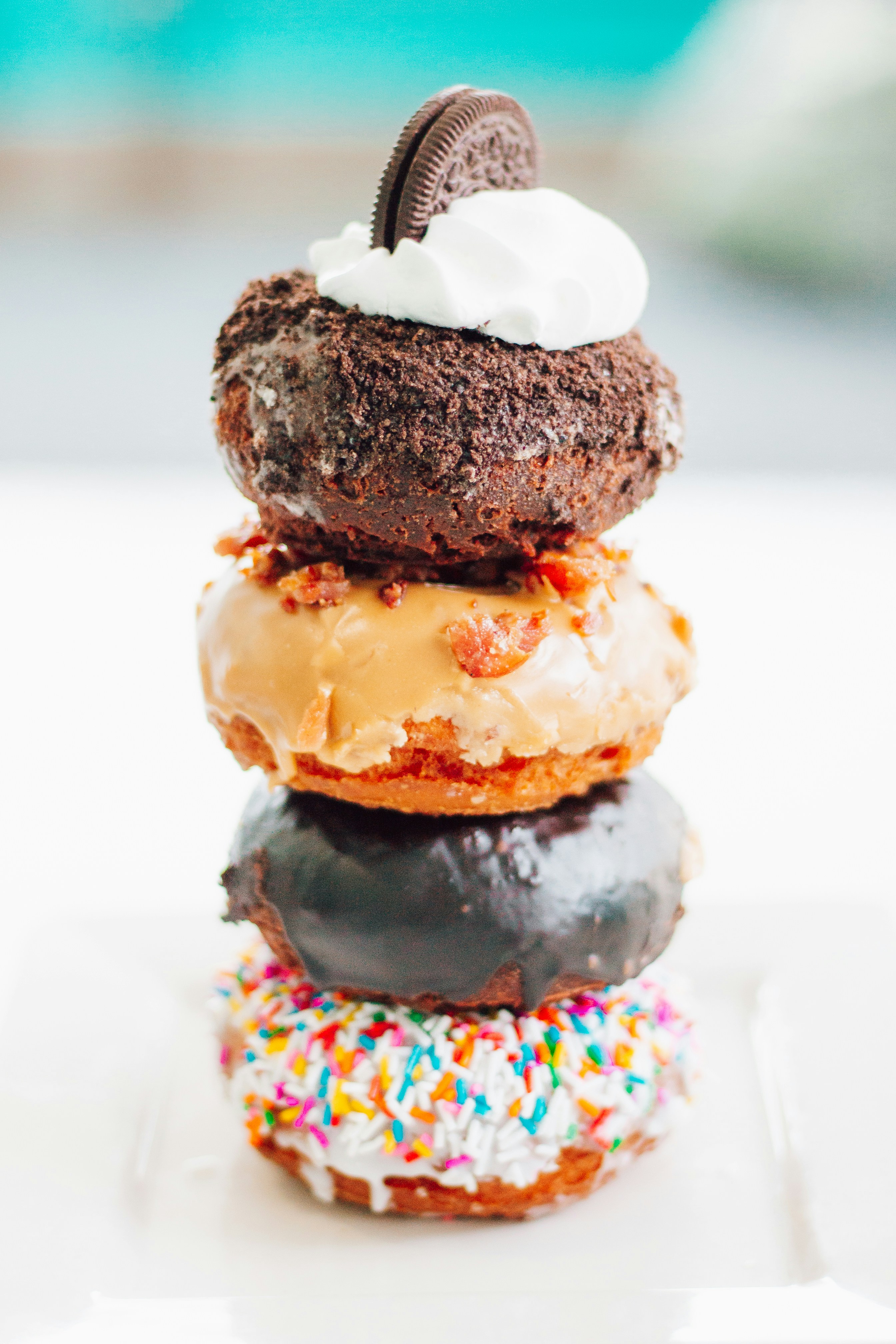 woman wearing yellow long-sleeved dress under white clouds and blue sky during daytime