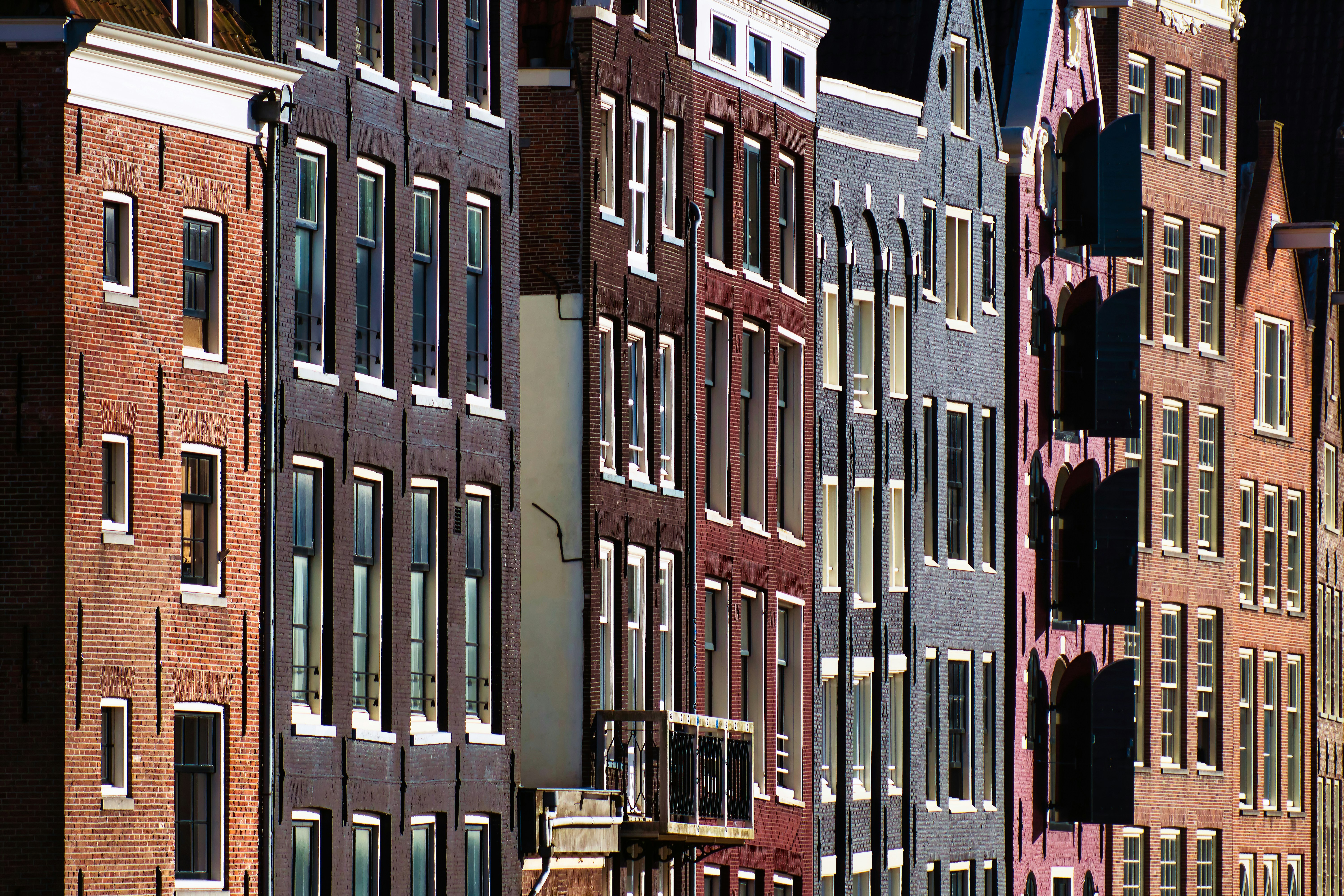 brown and white concrete building during daytime