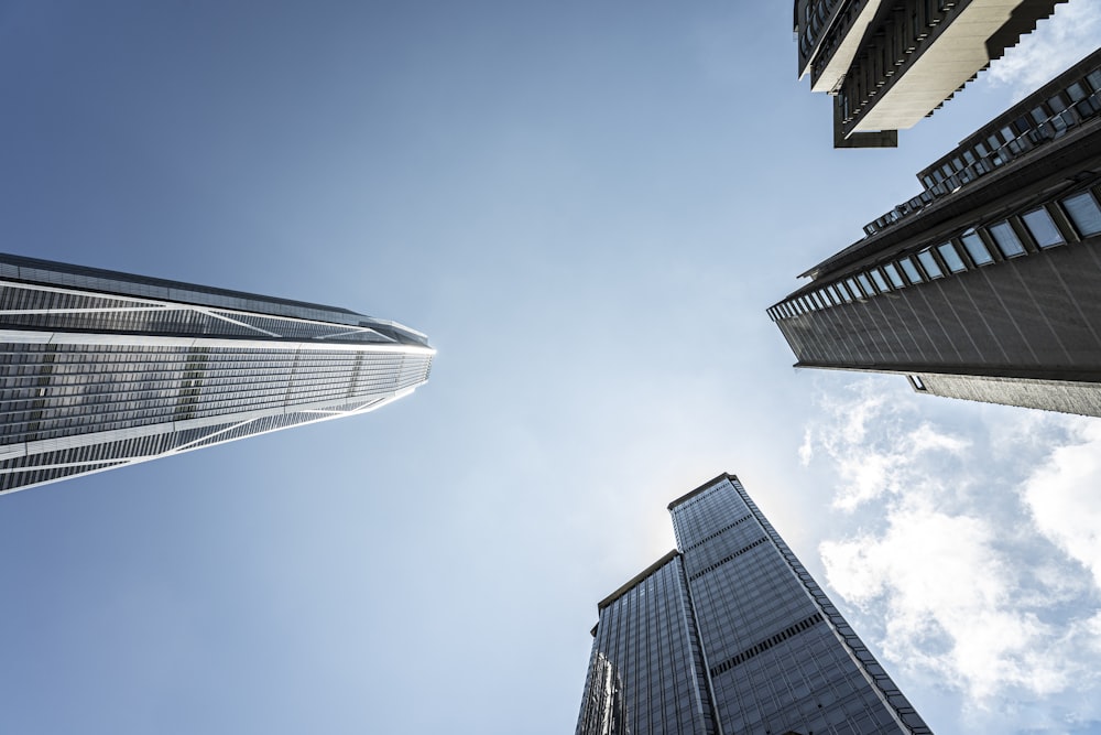 low angle photography of high rise buildings