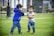 Two kids playing together in colorful Kiddie Crew apparel.