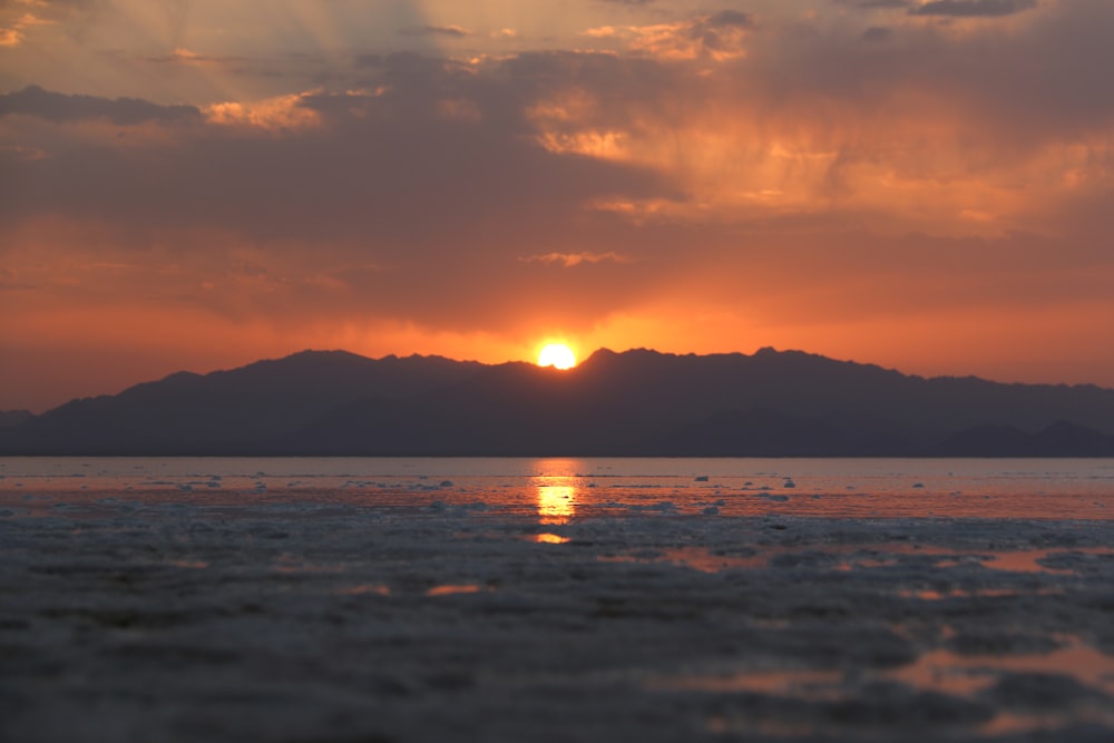 silhouette of mountain during sunset