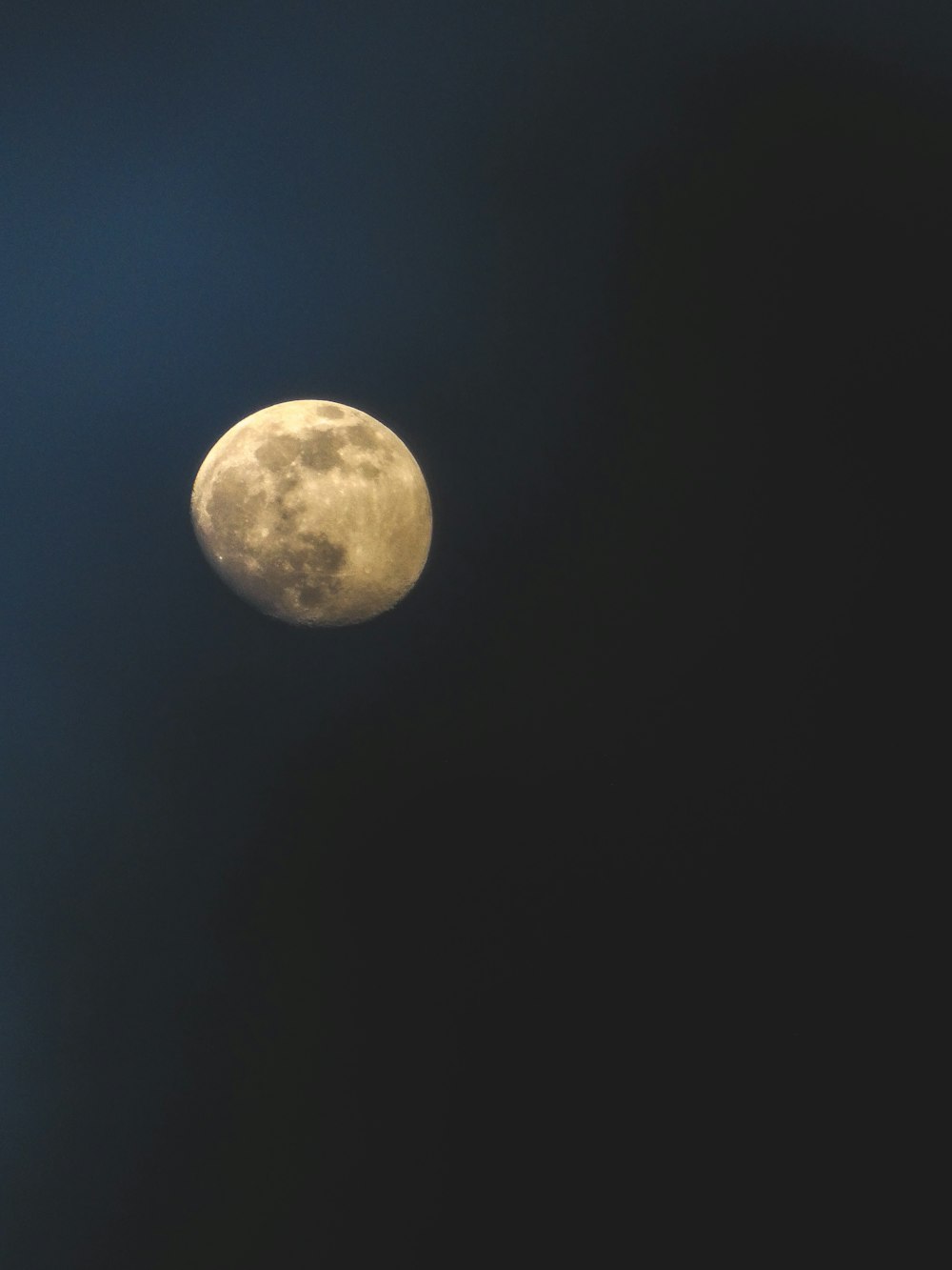 full moon in dark night sky