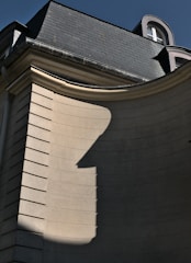 Artful curved sheet metal detail accentuating a home's architectural features.