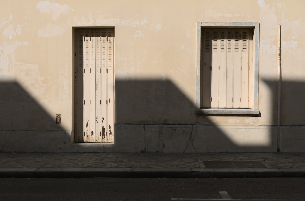 white wooden wall mounted door